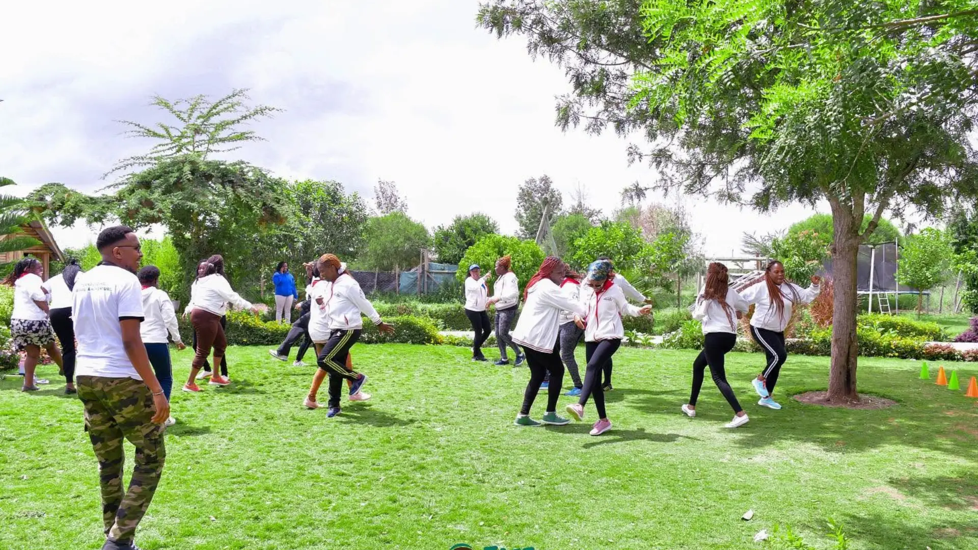 Corporate team collaborating during an outdoor team building session